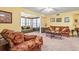 A spacious living room with neutral walls and an ornate seating arrangement at 2276 Essex Dr. # H, Surfside Beach, SC 29575