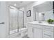 Modern bathroom features walk-in shower, single vanity, and neutral paint at 2557 Pete Dye Dr. # 402, North Myrtle Beach, SC 29582