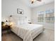 Comfortable bedroom with a queen bed, neutral decor and large window at 2557 Pete Dye Dr. # 402, North Myrtle Beach, SC 29582