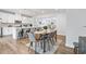 Bright dining area with a view of the kitchen and living spaces, offering open-concept living at 2557 Pete Dye Dr. # 402, North Myrtle Beach, SC 29582