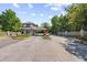 Community entrance featuring a guard house, gate, landscaping and brick fencing at 2557 Pete Dye Dr. # 402, North Myrtle Beach, SC 29582