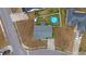 Aerial view of a residential property, highlighting the roof, driveway and backyard at 2601 Rosehip Ct., Conway, SC 29527