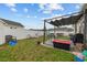 Backyard featuring a covered patio, outdoor seating, lawn, and a privacy fence, ideal for outdoor entertaining at 2601 Rosehip Ct., Conway, SC 29527