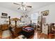 Bedroom with hardwood floors, a decorative ceiling fan, and a full-size bed at 2601 Rosehip Ct., Conway, SC 29527