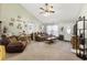 Bright living room with a vaulted ceiling, comfortable seating, and neutral décor, creating a welcoming atmosphere at 2601 Rosehip Ct., Conway, SC 29527