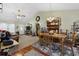 Open-concept living room and dining area featuring hardwood floors and plenty of natural light, ideal for modern living at 2601 Rosehip Ct., Conway, SC 29527