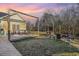Inviting backyard with a deck, outdoor seating and string lights create a relaxing entertainment space at 2724 A C Ln, Conway, SC 29526