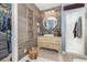 Elegant bathroom features wood wall, rustic vanity, vessel sink, and walk-in shower at 2724 A C Ln, Conway, SC 29526