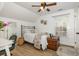 Well-lit bedroom with wood floors, desk, and charming decor at 2724 A C Ln, Conway, SC 29526