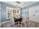 Dining room with farmhouse style table and chairs, and modern lighting at 2724 A C Ln, Conway, SC 29526