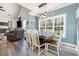 Dining area features a large window, modern lighting, and rustic table at 2724 A C Ln, Conway, SC 29526