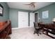 Green bedroom with closet, desk, chair, ceiling fan, and neutral carpet at 304 Canyon Dr., Conway, SC 29526