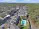 Aerial view showcasing a community swimming pool, lush landscaping, and well-maintained buildings at 340 Lands End Blvd. # 18, Myrtle Beach, SC 29572