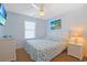 Bright bedroom featuring beach-themed decor, a TV, and coordinated furnishings at 340 Lands End Blvd. # 18, Myrtle Beach, SC 29572