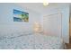 Bedroom features beachy decor, closet, and a bright, airy atmosphere at 340 Lands End Blvd. # 18, Myrtle Beach, SC 29572