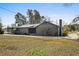Charming single story home with a covered front porch and mature landscaping at 3807 Casey St., Loris, SC 29569