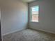 Carpeted bedroom with window allowing natural light at 4000 Braid Ct., Myrtle Beach, SC 29588