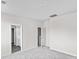 Spacious bedroom with plush carpet and two open doorways to other rooms at 439 Falling Leaf Loop, Myrtle Beach, SC 29588
