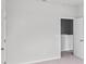 Neutral bedroom with carpet flooring, white walls, and a closet with a white door at 439 Falling Leaf Loop, Myrtle Beach, SC 29588