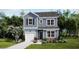 Charming two-story home featuring blue siding, black shutters, and a well-manicured lawn at 439 Falling Leaf Loop, Myrtle Beach, SC 29588