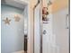 Bright bathroom features a stand-up shower with sleek sliding glass doors at 4239 Rivergate Ln., Little River, SC 29566