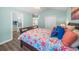 Comfortable bedroom with a wood-framed bed, coastal decor, and neutral flooring at 4239 Rivergate Ln., Little River, SC 29566