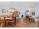 Open concept floor plan showcases the dining room, with a view of the kitchen and hallway at 4239 Rivergate Ln., Little River, SC 29566