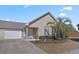 Attractive home featuring a well-kept lawn, a garage, and a charming entryway, full of curb appeal at 4239 Rivergate Ln., Little River, SC 29566