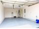 Spacious and clean garage with painted floors, offering ample storage and parking at 4239 Rivergate Ln., Little River, SC 29566
