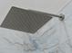 Contemporary square rainfall shower head with stylish marble-look tile surround at 4239 Rivergate Ln., Little River, SC 29566
