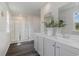 Modern bathroom with a double vanity, a glass-enclosed shower, and contemporary finishes at 445 Acosta Circle, Conway, SC 29527