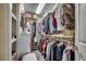 Organized walk-in closet with ample storage and shelving for clothing and accessories at 4494 Aberdeen Way, Myrtle Beach, SC 29579