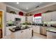 Well-equipped kitchen boasting stainless steel appliances and a center island at 4494 Aberdeen Way, Myrtle Beach, SC 29579