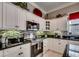 Updated kitchen featuring stainless steel appliances and black granite countertops at 4494 Aberdeen Way, Myrtle Beach, SC 29579