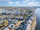 Scenic aerial view of a waterfront community, marina, and the Intracoastal Waterway at 4535 Lightkeepers Dr. # 27B, Little River, SC 29566
