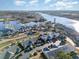 Beautiful aerial view of waterfront condos near the marina and a lighthouse at 4535 Lightkeepers Dr. # 27B, Little River, SC 29566