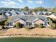 Aerial view of the home features a beautiful view of the lake and multiple outdoor patios at 4535 Lightkeepers Dr. # 27B, Little River, SC 29566