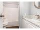 Clean bathroom with a white vanity, marble countertop, sink and bathtub at 4535 Lightkeepers Dr. # 27B, Little River, SC 29566