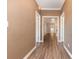 Inviting hallway with beautiful floors and a view to the living area at 4535 Lightkeepers Dr. # 27B, Little River, SC 29566