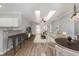 Bright and open living space with modern decor, seamlessly flowing into the kitchen at 4535 Lightkeepers Dr. # 27B, Little River, SC 29566