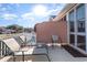 Outdoor patio with lounge chairs, a small side table and a partial view of the landscape at 4535 Lightkeepers Dr. # 27B, Little River, SC 29566