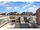 Back patio with outdoor chairs and neighborhood views at 4535 Lightkeepers Dr. # 27B, Little River, SC 29566