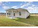 Home with a covered patio that provides the perfect spot for outdoor relaxation at 457 Acosta Circle, Conway, SC 29527