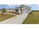 Cozy single-story home with a well-maintained lawn and a neatly paved driveway at 457 Acosta Circle, Conway, SC 29527