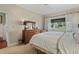 Cozy bedroom with a dresser, window, and carpeted floors at 48 Twelve Oaks Dr. # 3, Pawleys Island, SC 29585