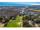 Scenic aerial view of a golf course with ocean views and lush green fairways at 48 Twelve Oaks Dr. # 3, Pawleys Island, SC 29585