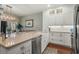 Gourmet kitchen with stainless steel appliances and a large island, perfect for cooking and casual dining at 48 Twelve Oaks Dr. # 3, Pawleys Island, SC 29585