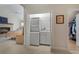 Convenient laundry area with stacked washer and dryer, plus easy access to closet and bedroom at 48 Twelve Oaks Dr. # 3, Pawleys Island, SC 29585