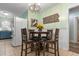 Eat-in kitchen featuring a charming dining area with seating for four and decorative accents at 4908 Main St., Loris, SC 29569