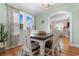 Charming dining room with hardwood floors and an archway leading to the living room at 4908 Main St., Loris, SC 29569